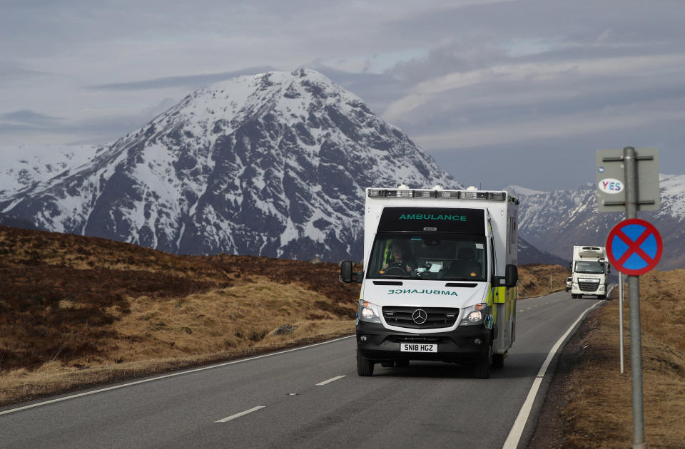 Image: An ambulance is driven on the A82, during the coronavirus disease (COVID-19) outbreak, near Buachaille Etive Mor, Scotland (Russell Cheyne / Reuters)