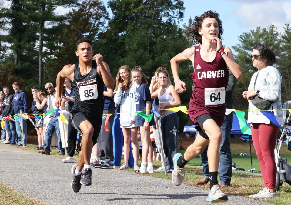 From left, Middleboro's Michael Neitlich, and Carver's Luke Holden, during the SSL Cross Country Championships at Nichols Middle School in Middleboro on Sunday, Oct. 31, 2021.