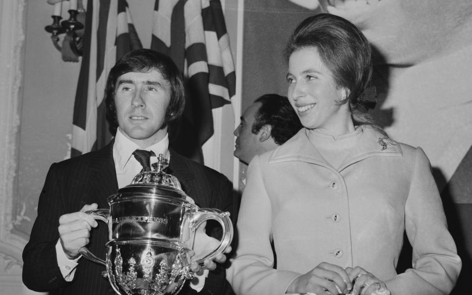 Scottish racing driver Jackie Stewart and Princess Anne at the Daily Express Sportsmen and Sportswomen of the Year Awards at the Savoy Hotel, London, UK, 10th December 1971. -  (Photo by Victor Blackman/Daily Express/Getty Images)/ (Photo by Victor Blackman/Daily Express/Getty Images)