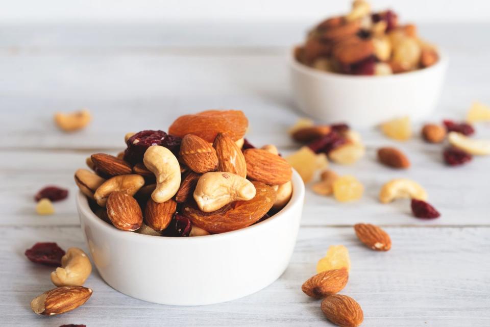 <p>Nuts make a filling <a href="https://www.prevention.com/weight-loss/g19576831/healthy-snack-ideas-weight-loss/" rel="nofollow noopener" target="_blank" data-ylk="slk:snack that promotes weight loss;elm:context_link;itc:0;sec:content-canvas" class="link ">snack that promotes weight loss</a> because they’re high in fiber, healthy fats, and protein. Bonus: The nutrients in nuts help reduce your risk of chronic conditions, like <a href="https://www.prevention.com/health/health-conditions/a21764231/type-2-diabetes-definition/" rel="nofollow noopener" target="_blank" data-ylk="slk:diabetes;elm:context_link;itc:0;sec:content-canvas" class="link ">diabetes</a> and <a href="https://www.prevention.com/health/health-conditions/g26253924/weird-heart-disease-risk-factors/" rel="nofollow noopener" target="_blank" data-ylk="slk:heart disease;elm:context_link;itc:0;sec:content-canvas" class="link ">heart disease</a>, says Mirkin.</p><p><strong>Try it:</strong> These <a href="https://www.prevention.com/food-nutrition/recipes/a22998801/cherry-chocolate-granola-bars-recipe/" rel="nofollow noopener" target="_blank" data-ylk="slk:cherry chocolate granola bars;elm:context_link;itc:0;sec:content-canvas" class="link ">cherry chocolate granola bars</a> pack a double dose of nuts with almond butter and chopped almonds.</p>