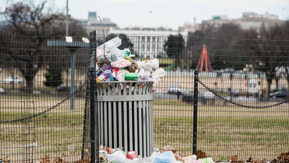 PHOTO: Garbage overflows a trash can on the National Mall across from the White House on Jan. 1, 2019 during the government shutdown. (Bill Clark/CQ-Roll Call via Getty Images, FILE)