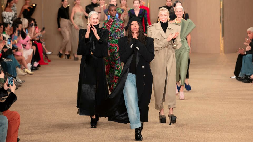 Balmain's long-standing artistic director Olivier Rousteing takes to the runway at the show's finale. - Ik Aldama/dpa/AP