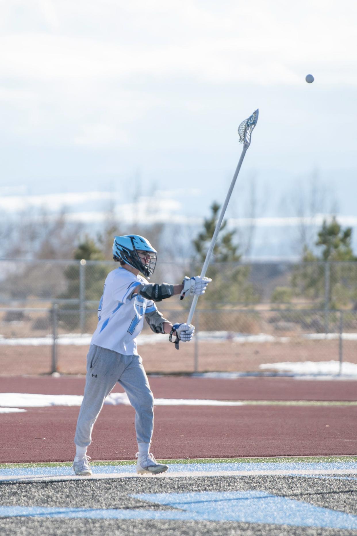 Pueblo West's Noah Dey fires off a pass during a game against Littleton on Friday, March 17, 2023.