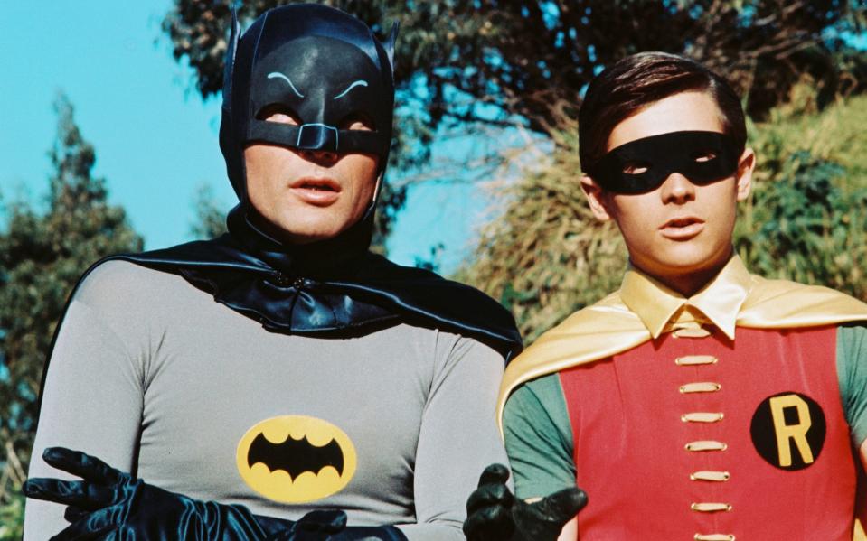 Adam West as Batman and Burt Ward as Robin - Getty