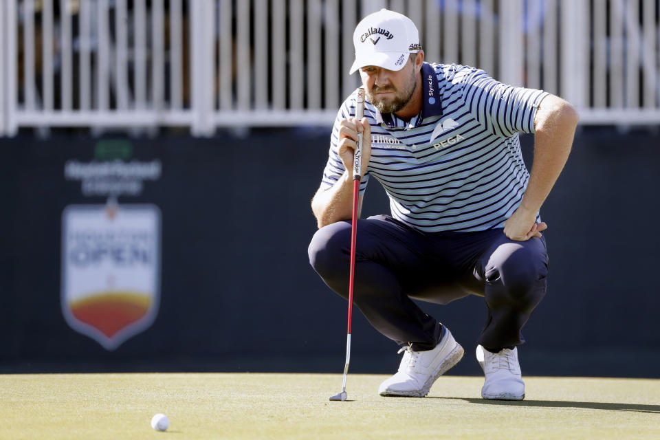 Marc Leishman sizes up the 15th green during the first round of the Houston Open golf tournament Thursday, Nov. 11, 2021, in Houston. (AP Photo/Michael Wyke)