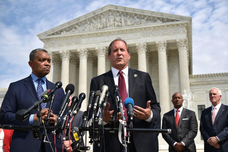 Texas Attorney General Ken Paxton (center) traveled to Utah last week during the winter storms that claimed dozens of lives and <a href="https://www.huffpost.com/entry/power-outages-texas-winter-snow_n_602d8719c5b673b19b65c341">knocked out power to millions</a> of residents. (Photo: MANDEL NGAN/AFP via Getty Images)