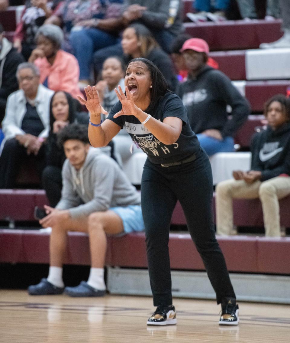 Wildcats head coach Jade Brown yells instructions to her players during the Booker T. Washington vs Pensacola girls basketball game at Pensacola High School on Friday, Jan. 20, 2023.