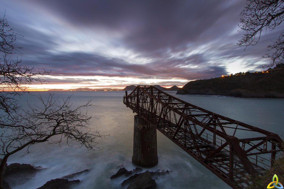 March 23: 'Remains of the past' by kgorka. A gorgeous sunrise looking out from an old loading bay in Mioño (Cantabria).