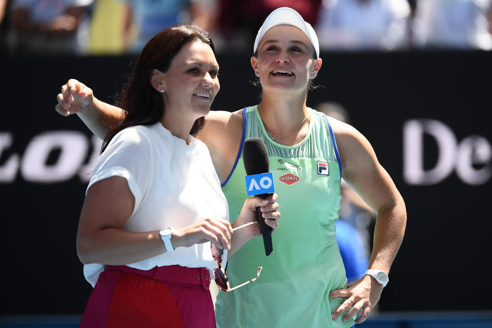 MELBOURNE, AUSTRALIA - JANUARY 28: Ashleigh Barty of Australia is interviewed by Casey Dellacqua following her Women's Singles Quarterfinal match against Petra Kvitova of Czech Republic on day nine of the 2020 Australian Open at Melbourne Park on January 28, 2020 in Melbourne, Australia. (Photo by Hannah Peters/Getty Images)