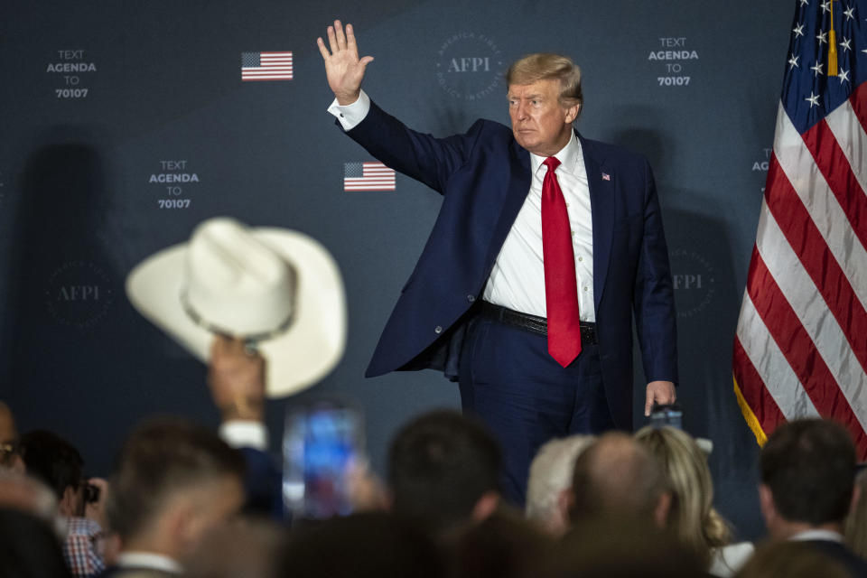 Former U.S. President Donald Trump acknowledges the crowd after speaking during the America First Agenda Summit, at the Marriott Marquis hotel July 26, 2022 in Washington, DC.  / Credit: Drew Angerer / Getty Images