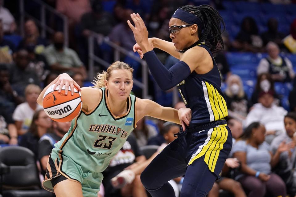 New York Liberty guard Marine Johannes (23) is defended by Dallas Wings guard Allisha Gray during the second half of a WNBA basketball game in Arlington, Texas, Wednesday, Aug. 10, 2022. (AP Photo/Tony Gutierrez)