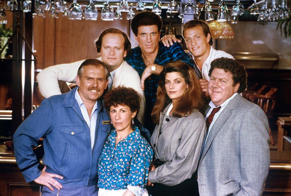 CHEERS -- Pictured: (top) Kelsey Grammer as Dr. Frasier Crane, Ted Danson as Sam Malone, Woody Harrelson as Woody Boyd, (bottom) John Ratzenberger as Cliff Clavin, Rhea Perlman as Carla Lozupone Tortelli LeBec,  Kirstie Alley as Rebecca Howe, George Wendt as Norm Peterson -- (Photo by: NBC)