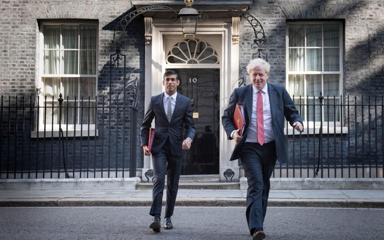 Rishi Sunak (left) and Boris Johnson leave 10 Downing Street - Stefan Rousseau /PA
