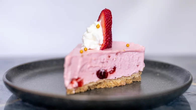 Slice of strawberry cheesecake