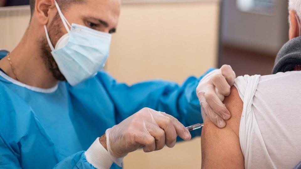 Person getting vaccine