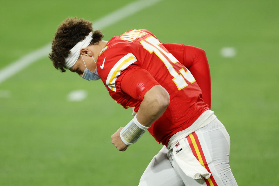 TAMPA, FLORIDA - FEBRUARY 07: Patrick Mahomes #15 of the Kansas City Chiefs wears a facemask while preparing for the start of Super Bowl LV against the Tampa Bay Buccaneers at Raymond James Stadium on February 07, 2021 in Tampa, Florida. (Photo by Patrick Smith/Getty Images)