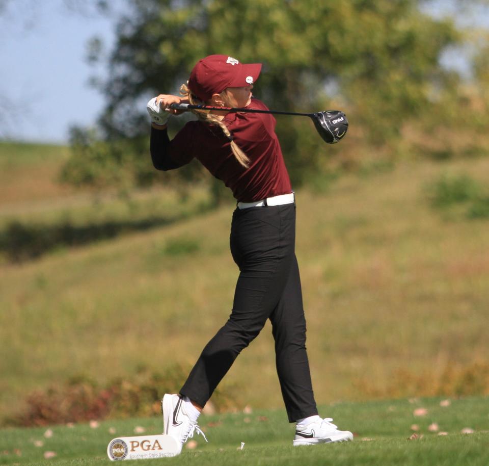 New Albany's Mia Hammond watches her drive on No. 8 at The Links at Echo Springs during the Division I district tournament on Wednesday. Hammond shot a 72 to help the Eagles win the team title.