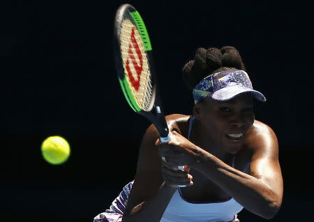 Tennis - Australian Open - Melbourne Park, Melbourne, Australia - 24/1/17 Venus Williams of the U.S. hits a shot during her Women's singles quarter-final match against Russia's Anastasia Pavlyuchenkova. REUTERS/Issei Kato