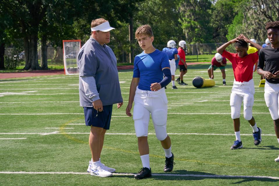 Sean Payton (Kevin James, left) reconnects with his son Connor (Tait Blum) on the football field in "Home Team." In real life, James counts his dad as his best coach.