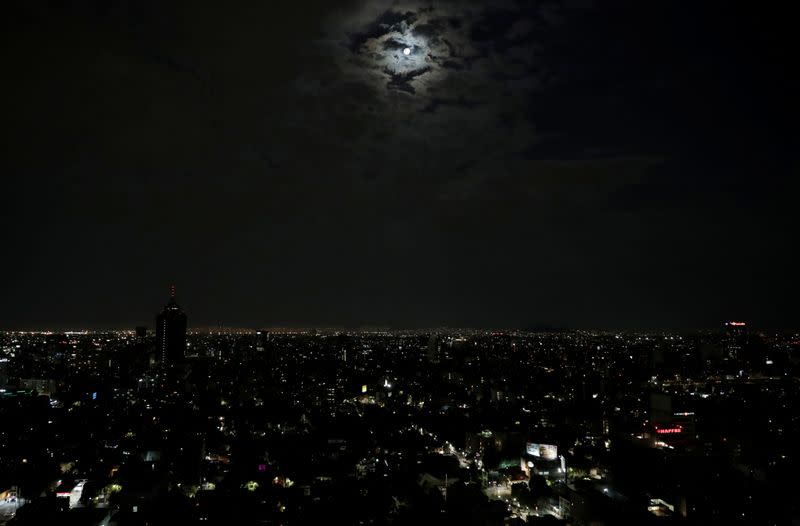 The Pink Supermoon is seen in Mexico City