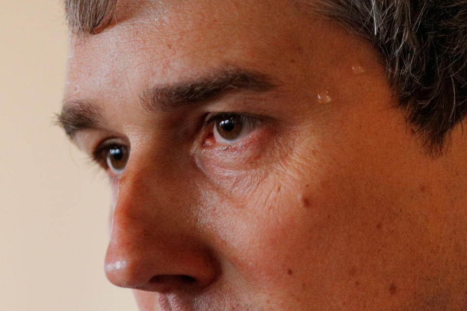 Sweat beads on the temple of Democratic presidential candidate and former Rep. Beto O'Rourke as he speaks during a campaign stop at Popovers Bakery and Cafe in Portsmouth, N.H., on Thursday. (Brian Snyder/Reuters)