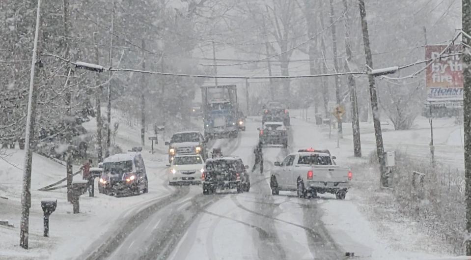 Traffic is snarled on a hill on North George Street in Manchester Township as heavy snow falls.