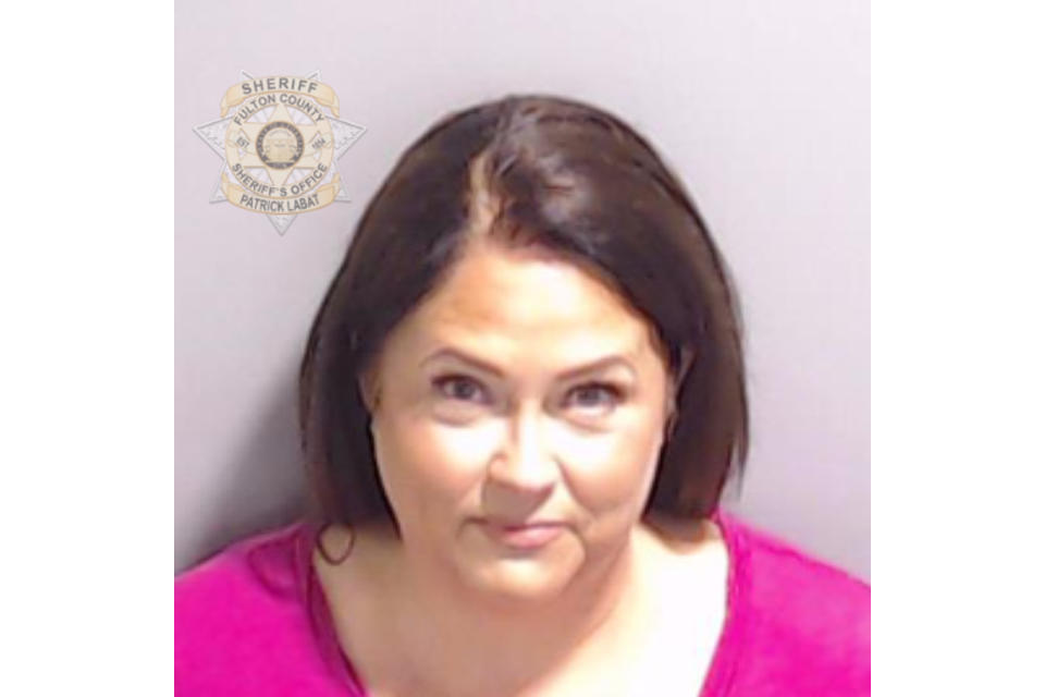 This booking photo provided by the Fulton County Sheriff's Office shows Misty Hampton on Friday, Aug. 25, 2023, in Atlanta, after she surrendered and was booked. Hampton is charged alongside former President Donald Trump and 17 others, who are accused by Fulton County District Attorney Fani Willis of scheming to subvert the will of Georgia voters to keep the Republican president in the White House after he lost to Democrat Joe Biden. (Fulton County Sheriff's Office via AP)