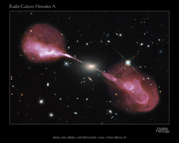 The same physical processes that power microquasars such as MQ1 are also at work in active galaxies and quasars (at much larger scales). Here we can see the same structure (powerful central black hole, jets, lobes) in the active galaxy Hercules