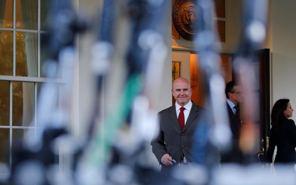  H.R. McMaster walks to the microphones to deliver a statement - Credit: Reuters