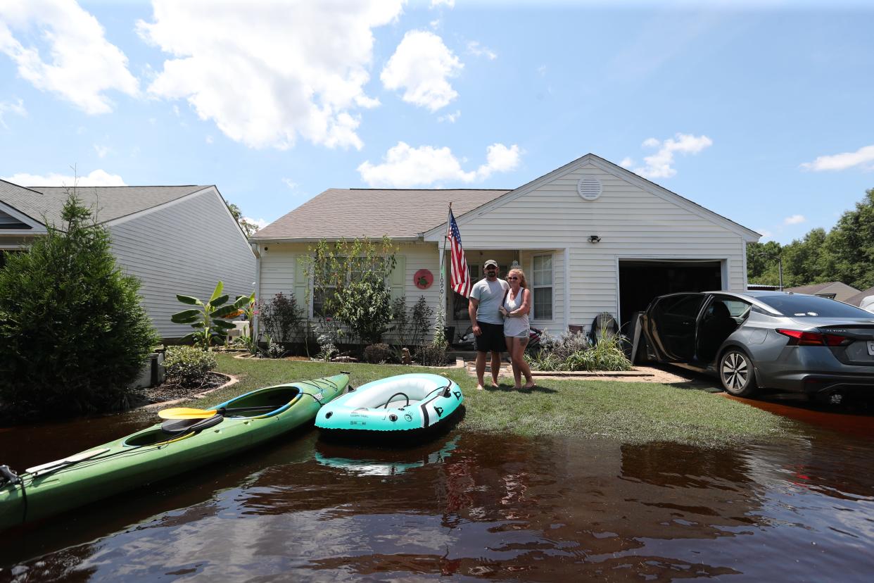 Eric and Rebecca Matyka are photographed at their home Thursday on Rushing Street in Richmond Hill.