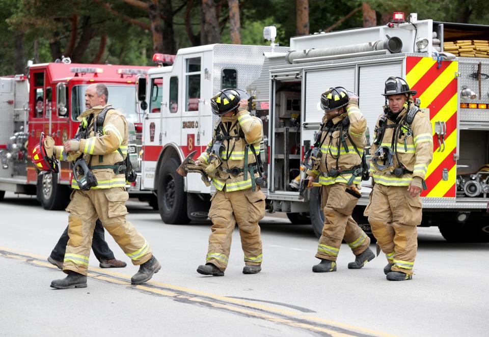 Firefighters outside of Crow's Nest Apartments on North Broadway after a fire was reported in one of the units on June 29, 2022, in De Pere, Wis.