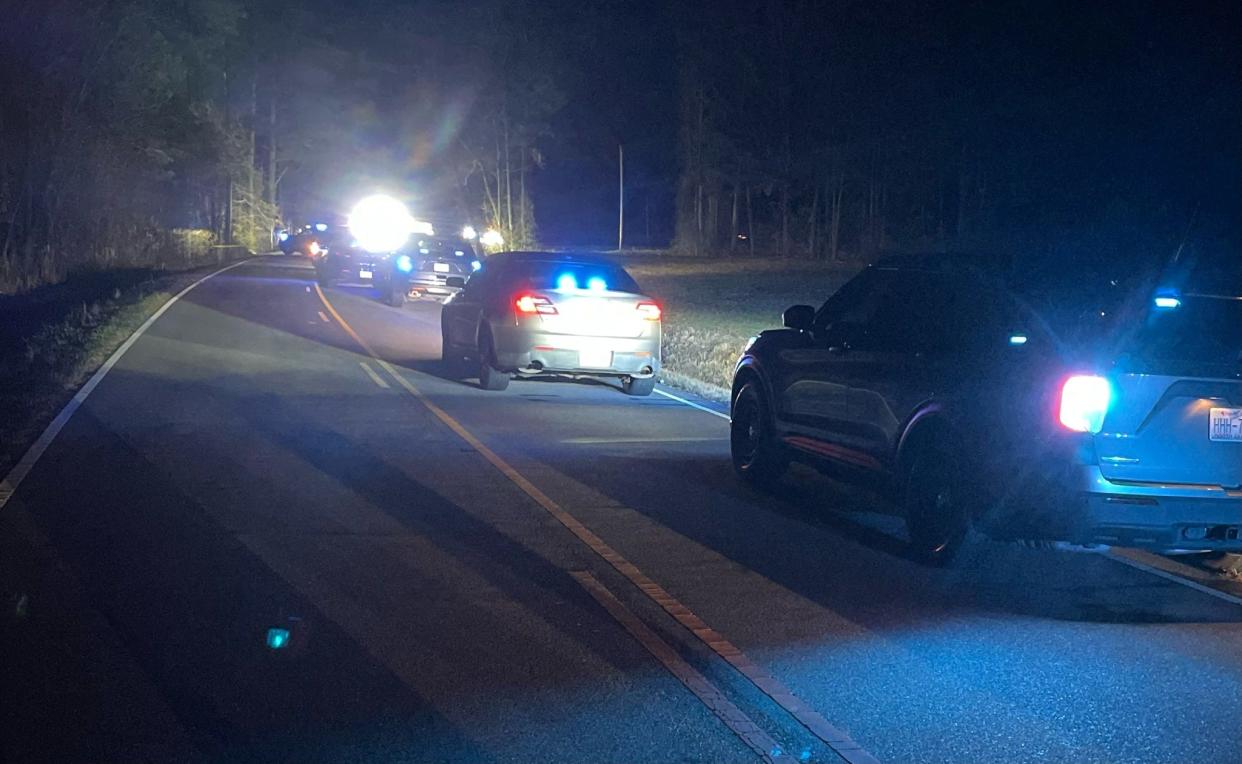 Cumberland County Sheriff's Office vehicles line River Road in Wade where the body  of Ashlee Chambers, of Fayetteville, was found Feb. 3, 2023.