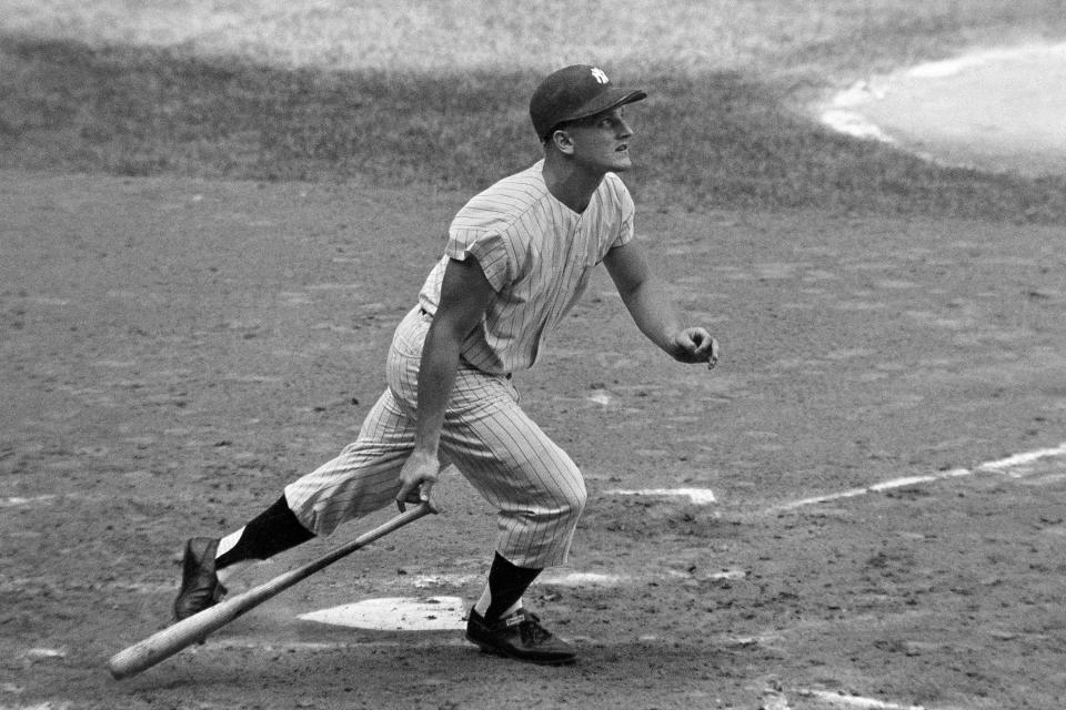 New York Yankees' Roger Maris watches his 61st home run of the season in the fourth inning of a baseball game against the Boston Red Sox in New York, Oct. 1, 1961. If Aaron Judge passes Roger Maris, some lucky fan might become this generation's Sal Durante. As a 19-year-old in 1961, Durante caught Maris' record-breaking 61st home run. (AP Photo/File)