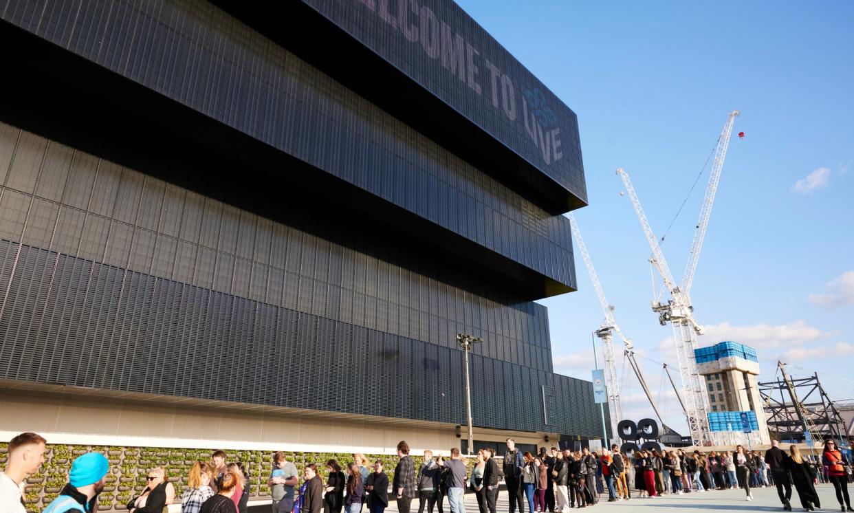 <span>People queue for the welcoming ceremony and test event for Co-op Live in Manchester.</span><span>Photograph: Christopher Thomond/The Guardian</span>