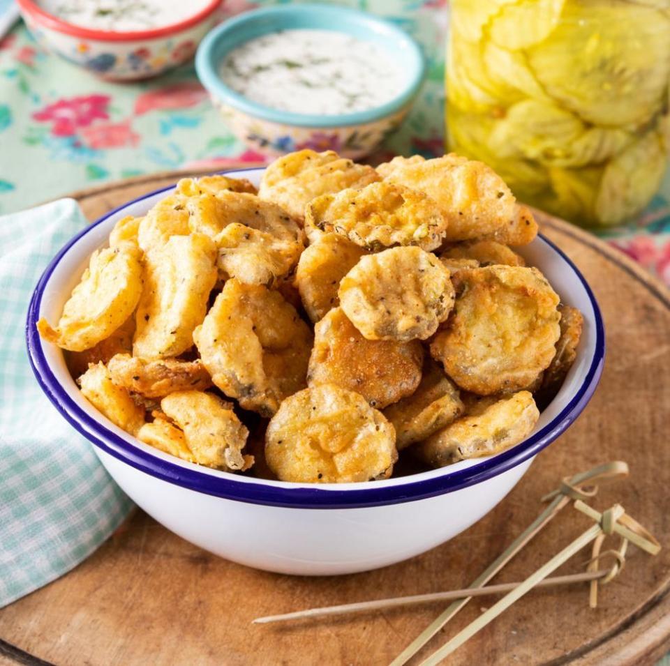 <p>Pickles are great when layered on burgers, but they’re even better when they’re battered and fried. Serve them instead of a bag of chips with a side of ranch for dipping.</p><p><a href="https://www.thepioneerwoman.com/food-cooking/recipes/a35880840/fried-pickles-recipe/" rel="nofollow noopener" target="_blank" data-ylk="slk:Get the recipe.;elm:context_link;itc:0;sec:content-canvas" class="link "><strong>Get the recipe. </strong></a></p><p><a class="link " href="https://go.redirectingat.com?id=74968X1596630&url=https%3A%2F%2Fwww.walmart.com%2Fsearch%2F%3Fquery%3Ddeep%2Bfry%2Bthermometers&sref=https%3A%2F%2Fwww.thepioneerwoman.com%2Ffood-cooking%2Fmeals-menus%2Fg36353420%2Ffourth-of-july-side-dishes%2F" rel="nofollow noopener" target="_blank" data-ylk="slk:SHOP DEEP FRY THERMOMETERS;elm:context_link;itc:0;sec:content-canvas">SHOP DEEP FRY THERMOMETERS</a></p>