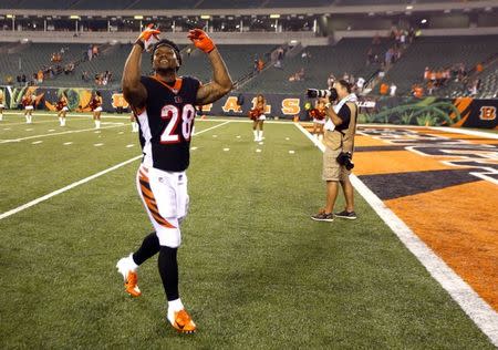 FILE PHOTO: Sep 13, 2018; Cincinnati, OH, USA; Cincinnati Bengals running back Joe Mixon (28) reacts to the fans after the Bengals defeated the Baltimore Ravens at Paul Brown Stadium. Mandatory Credit: David Kohl-USA TODAY Sports/File Photo