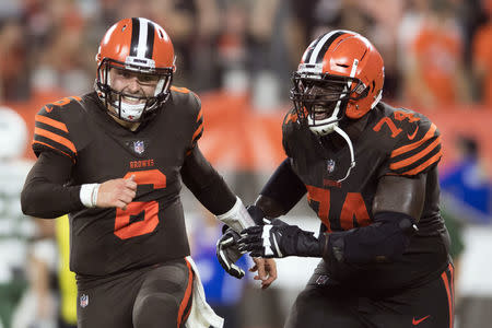 Cleveland Browns quarterback Baker Mayfield and offensive guard Chris Hubbard celebrate after a two-point conversion during the third quarter against the New York Jets. The Browns beat the Jets to win their fist game in 635 days. Ken Blaze-USA TODAY Sports