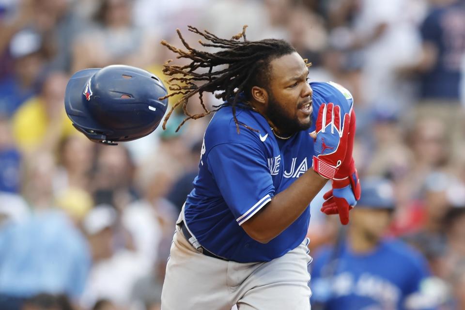 Toronto Blue Jays' Vladimir Guerrero Jr. runs as he hits into a double play during the sixth inning of a baseball game against the Boston Red Sox, Saturday, Aug. 5, 2023, in Boston. (AP Photo/Michael Dwyer)