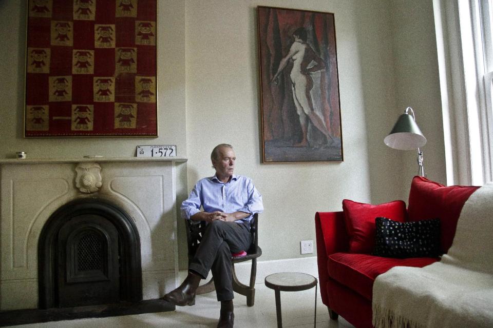 This Aug. 17, 2012 photo shows British novelist Martin Amis pose in the living room of his new home in the Brooklyn borough of New York. Amis’s new novel is titled “Lionel Asbo: State of England.” (AP Photo/Bebeto Matthews)