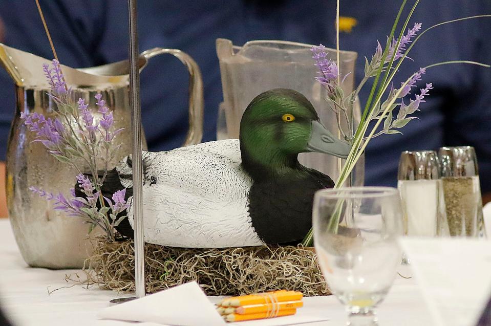 The centerpieces on the tables were duck decoys in honor of Duck Dynasty's Alan Robertson delivering the keynote address at the Ashland County Ministerial Association's Ashland Community Prayer breakfast to celebrate National Day of Prayer on Thursday, May 5, 2022 at Ashland University's John C. Myers Convocation Center. TOM E. PUSKAR/TIMES-GAZETTE.COM