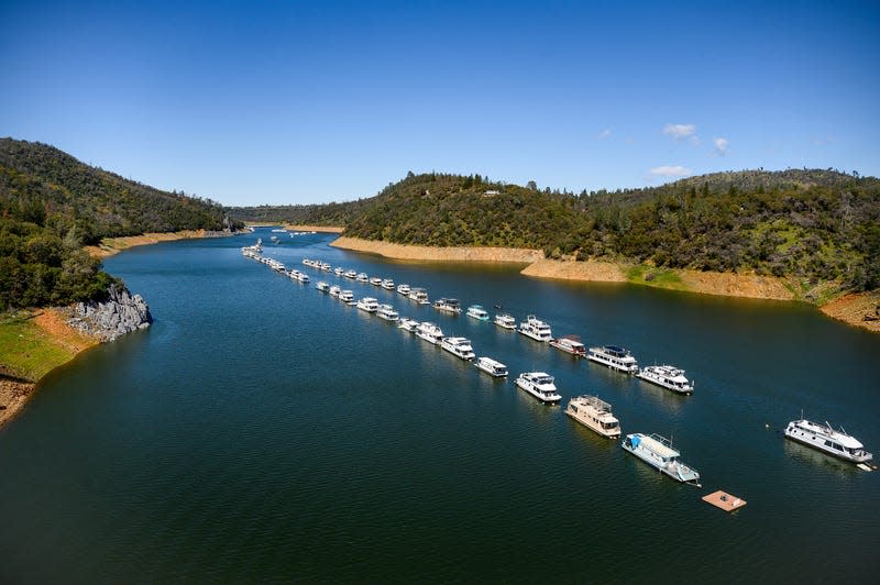 Houseboats float at Lake Oroville State Recreation Area March 26, 2023, in Butte County, California. 