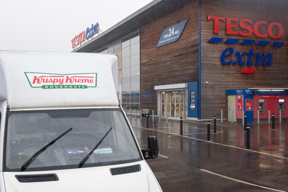 Cambridgeshire Police officer Simon Read is facing charges of attempting to to buy a box of 12 Krispy Kreme donuts for seven pence by sticking a barcode for carrots. Source: PA via AAP