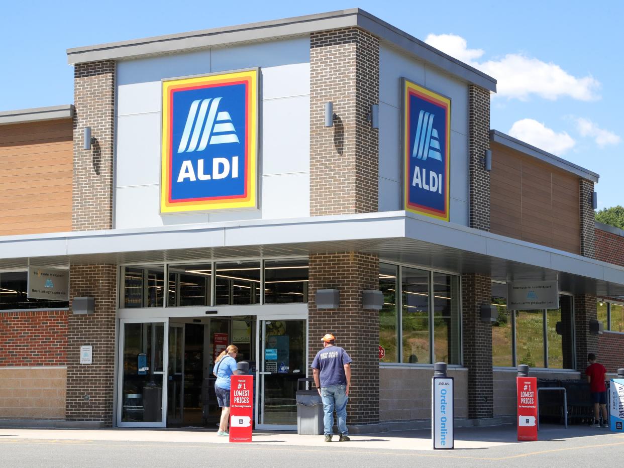 Shoppers are seen outside of an Aldi grocery store in Coal Township, Pennsylvania on August 12, 2022.