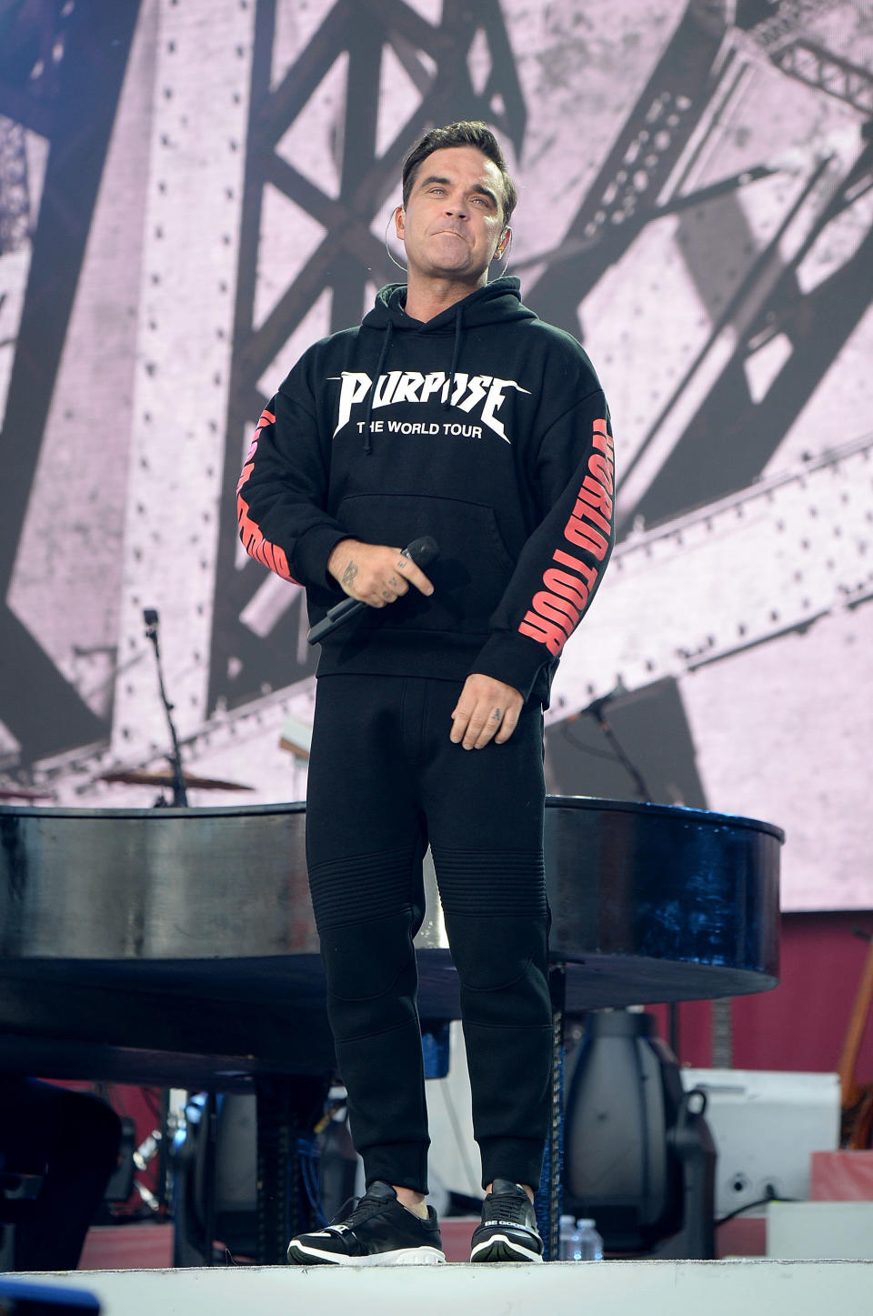 Robbie Williams performs on stage during the One Love Manchester Benefit Concert at Old Trafford on June 4, 2017 in Manchester, England.&nbsp;