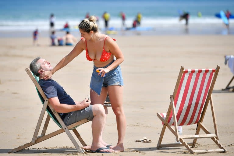 The UK is expected to bask in heat of 30C and upwards as the country edges towards the hottest ever July day in recorded history, the Met Office has said.Public Health England has renewed warnings about the heat, urging people to keep hydrated, find shade and take protection against the sun.Forecasters have predicted temperatures of up to 39C could take hold before the end of the week. The current record for a July day was set at Heathrow Airport in 2015 with 36.7C – but experts have predicted a 60 per cent chance that temperatures could surpass this on Thursday.And they reckon there is a 30 per cent chance that the all-time hottest day – 38.5C recorded in Faversham in August 2003 – could be topped too.Please allow a moment for the live blog to load