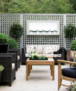<p> 'Adding trellis to the top of a fence will of course offer extra screening and privacy in a backyard, but there are other ways to use trellis ideas cleverly,' says <em>H&G</em>'s garden expert Rachel Crow. </p> <p> 'One of those ways is perfectly illustrated above, where the trellis provides screening that isn't entirely opaque. The benefit of this is that you can either simply divide a backyard by zone, for example, a kids' play area from an adults' seating area, while still being able to see into the other area. Or, you can make the most of a "borrowed view", perhaps a beautiful woodland to the back of your yard, which can help to make a small garden look bigger. </p>