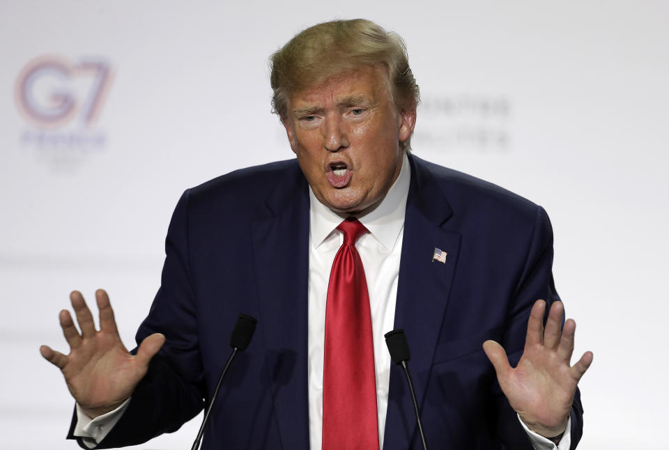 President Donald Trump gestures during a press conference on the third and final day of the G-7 summit in Biarritz, France Monday, Aug. 26, 2019. (AP Photo/Markus Schreiber)