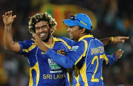 Sri Lanka's Lasith Malinga celebrates with team captain Mahela Jayawardene (R) during their first Twenty20 match on June 1. Sri Lanka will look to improve their recent one-day record against Pakistan when they clash in a five-match series starting in Pallekele on Thursday