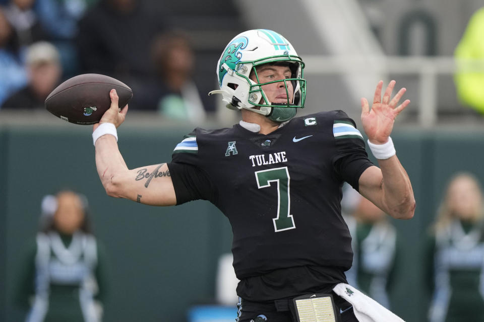 Tulane quarterback Michael Pratt (7) passes in the first half of an NCAA college football game against UTSA in New Orleans, Friday, Nov. 24, 2023. (AP Photo/Gerald Herbert)