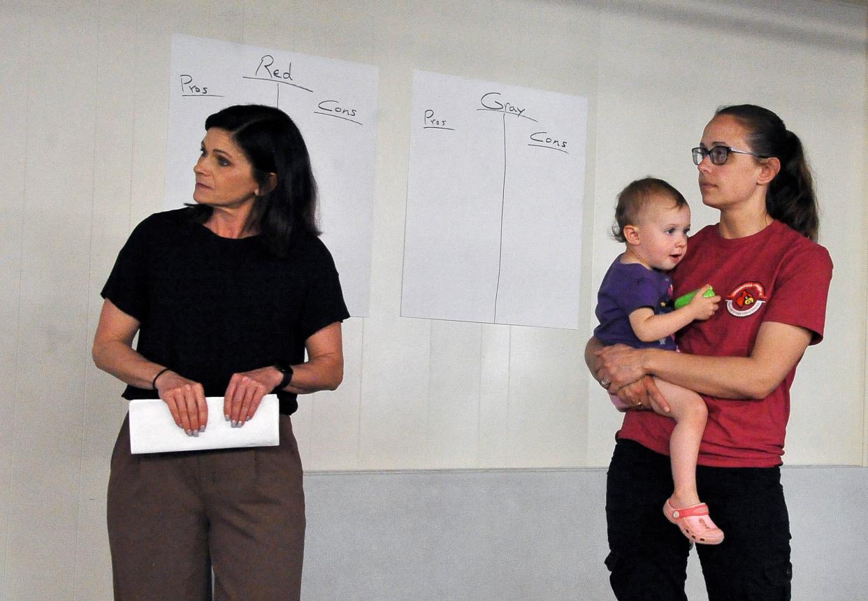 Loudonville-Perrysville teachers Carol Hinkley, left, and Angie Spreng talked about things they saw in schools they visited that could be implemented in a new building in the local district.